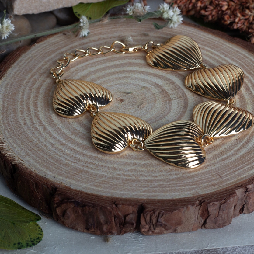 Pulseira De Coração Com Listras Dourada