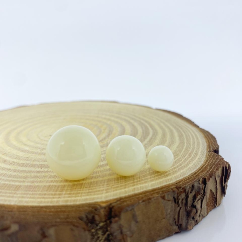 Brinco Trio Bolas Marfim